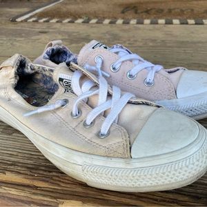 Womens light pink slip on Chuck Taylor sneakers, size 10.